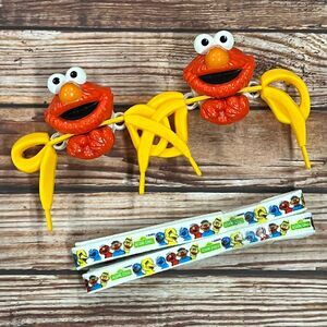 ((SOLD VIA CROSSPOST))
Vintage Elmo Sesame Street Bow Biters plus Laces